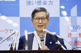 Japan's top COVID-19 adviser Omi