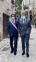 President Macron During A Visit In Saint-Cirq-Lapopie