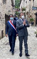 President Macron During A Visit In Saint-Cirq-Lapopie