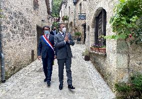 President Macron During A Visit In Saint-Cirq-Lapopie