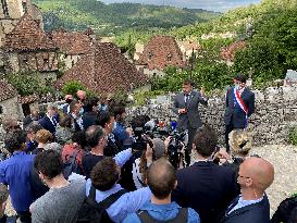 President Macron During A Visit In Saint-Cirq-Lapopie