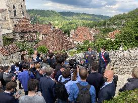 President Macron During A Visit In Saint-Cirq-Lapopie