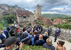 President Macron During A Visit In Saint-Cirq-Lapopie