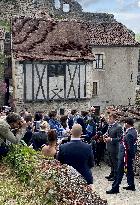 President Macron During A Visit In Saint-Cirq-Lapopie