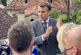 President Macron During A Visit In Saint-Cirq-Lapopie