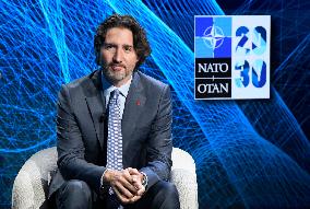 NATO Summit - Justin Trudeau and Eglis Levits