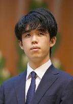 Fujii becomes youngest shogi player to hold 3 titles