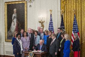 US President Joe Biden participates in a bill signing ceremony for the Crime Victims Fund Act of 2021