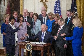 US President Joe Biden participates in a bill signing ceremony for the Crime Victims Fund Act of 2021