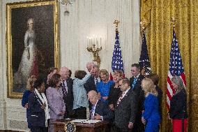 US President Joe Biden participates in a bill signing ceremony for the Crime Victims Fund Act of 2021