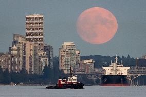 Full Moon Rises Behind Towers - Vancouver