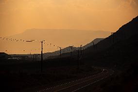 Smoke From Wildfires Burning In The Area Hangs In The Air - B.C