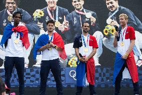 France gold medalists foil fencing team at the fan zone of the Trocadero - Paris