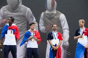 France gold medalists foil fencing team at the fan zone of the Trocadero - Paris