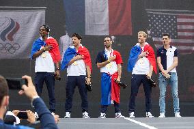 France gold medalists foil fencing team at the fan zone of the Trocadero - Paris