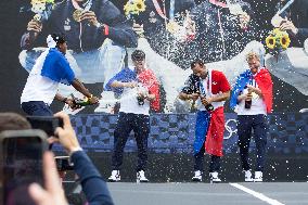 France gold medalists foil fencing team at the fan zone of the Trocadero - Paris