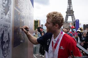 France gold medalists foil fencing team at the fan zone of the Trocadero - Paris
