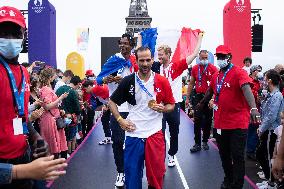 France gold medalists foil fencing team at the fan zone of the Trocadero - Paris