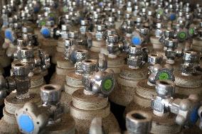 Workers supply oxygen tanks as new Delta variant of Covid-19