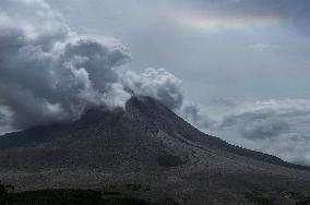 Daily-life Under Shadows Sinabung Eruption - Indonesia