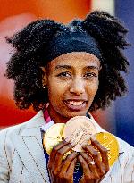 Sifan Hassan Shows Off Her 3 Medals - Netherlands