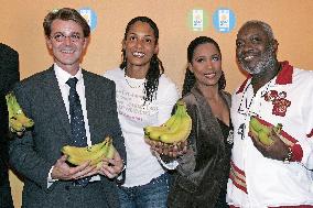 Francois Baroin and Christine Arron promotes the French west Indies banana in Paris