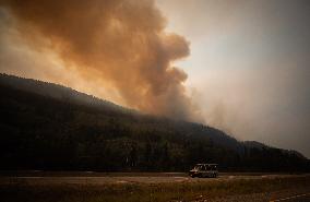 July Mountain Wildfire Burns Along Highway - Canada