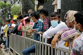 Passengers Queue To Board In Bangladesh