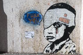 Street artist Laika's mural 'Tears of Kabul'