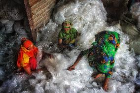 Collecting Raw Material In A Polythene Factory - Bangladesh