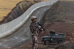 Turkey tightens security measures, builds wall along its border with Iran