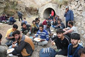 Afghan refugees crossing illegally entering Turkey