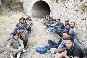 Afghan refugees crossing illegally entering Turkey