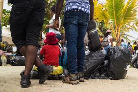 Migrants Try To Pass Colombia-Panama Border