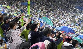 Japan eases limits on attendance at large events