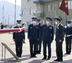 Defense minister at air base in western Japan