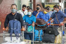Migrant Worker Queuing To Enter Airport - Dhaka