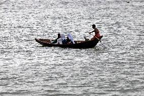 Boatman Transports Passenger On The River - Dhaka