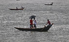 Boatman Transports Passenger On The River - Dhaka