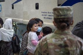 Afghan Refugees arrive at Washington Dulles Airport