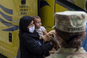 Afghan Refugees arrive at Washington Dulles Airport