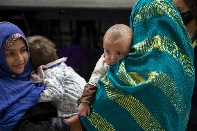 Afghan Refugees Arrive At Dulles Airport - Virginia