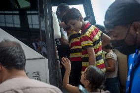 Afghan Refugees Arrive At Dulles Airport - Virginia