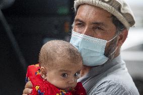 Afghan Refugees Arrive At Dulles Airport - Virginia