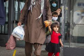 Afghan Refugees Arrive At Dulles Airport - Virginia