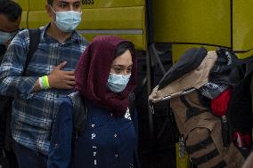 Afghan Refugees Arrive At Dulles Airport - Virginia