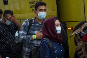 Afghan Refugees Arrive At Dulles Airport - Virginia