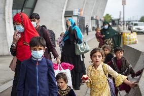 Afghan Refugees Arrive At Dulles Airport - Virginia