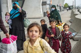 Afghan Refugees Arrive At Dulles Airport - Virginia