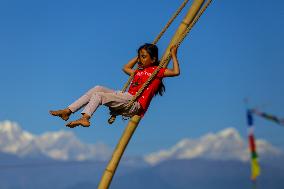 Enjoying traditional Swing in Nepal